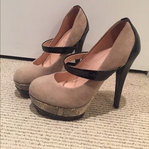 Closed toe snake print heels